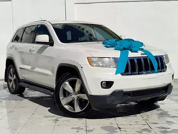 jeepetas y camionetas - JEEP GRAND CHEROKEE LAREDO 2012: