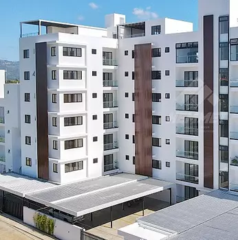 apartamentos - PRIMER NIVEL CON ROOFTOP Y PARQUEOS TECHADOS JARDINES DEL ESTE STGO. 
