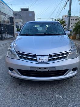 carros - Nissan tiida de la casa