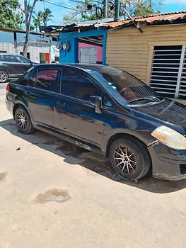 carros - Nissan versa 2009