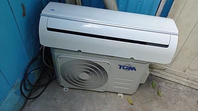 Corotos | Aire marca TGM, 12,000 BTU.