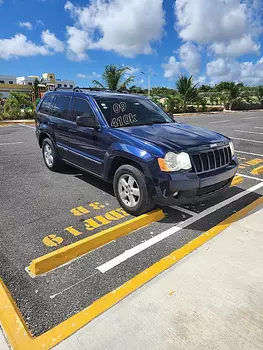 jeepetas y camionetas - 2009 Jeep grand cherokee laredo 4x4 motivo de viaje, vendedor motivado.